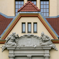 Architectural detail of the facade of an old tenement house.