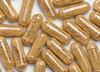 Transparent medical capsules on a white background, tablets for treatment, vitamins