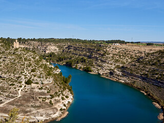 Obraz premium Alarconcillos (or Alarconcillo) Tower on a bend of the Jucar river. Alarcon, province of Cuenca, Castilla La Mancha, Spain, Europe