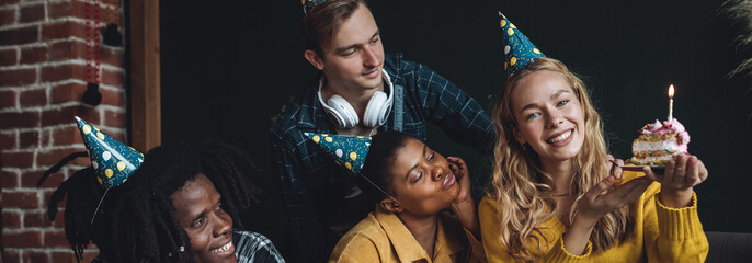 Group of diverse friends, young cheerful men and women, college university international students celebrating birthday anniversary looking happy, smiling. Multi cultural have fun banner