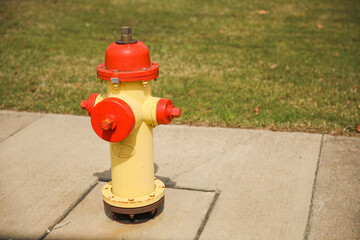 fire hydrant on a street corner, symbolizing the crucial role it plays in ensuring public safety and protecting against the devastating effects of fires