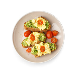 Plate with tasty scrambled eggs sandwiches and vegetables on white background