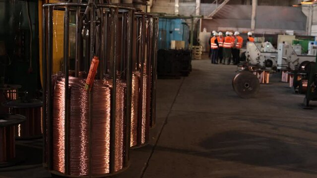 raw material, Electrical cables, Copper stamping. Industrial plant, copper wire and cable are made, cable is produced in coils, coils of copper wire.