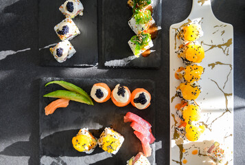 Close up of tasty japanese uramaki sushi with salmon