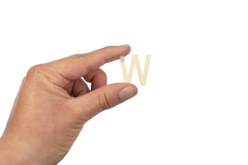 Unrecognizable person holding a letter w on a white background