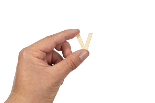 Unrecognizable person holding a letter v on a white background