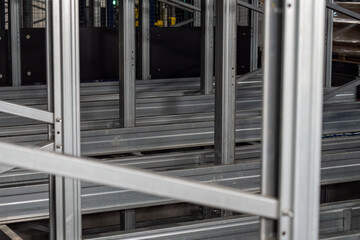 Metal parts of the rack for inserting pallets.