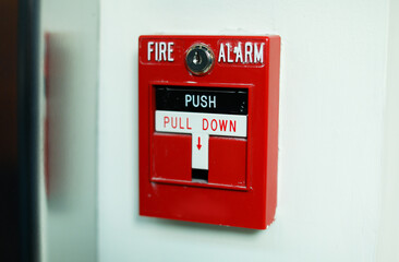 A fire alarm is a symbol of warning, safety, and preparedness. It represents the importance of being alert and taking action in the face of danger. Its loud sound and flashing lights lights emergency