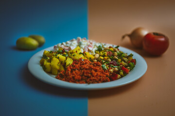 Healthy Salad Selection with Mediterranean Flavours: Fresh and Flavourful Couscous, Potato, and Chickpea Salad. A Gourmet Delight for Health Conscious Foodies with Satisfying and Nutritious