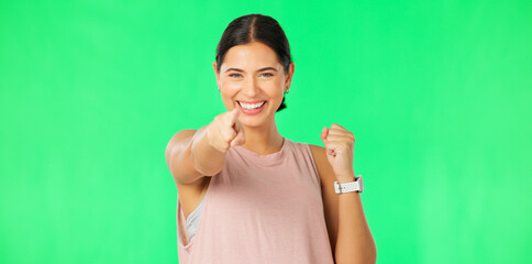 Celebration, excited and face of woman on green screen for good news, winning and promotion in studio. Success, happy mockup and portrait of isolated girl point, cheering and clap hands for victory