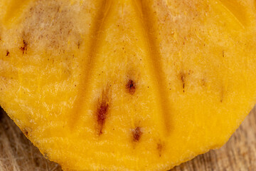 Half-ripe Orange persimmon, close up