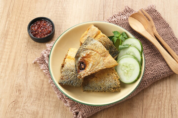 Bandeng Presto or Milkfish with high pressure cooked, served with chilli sauce (sambal), Indonesian...