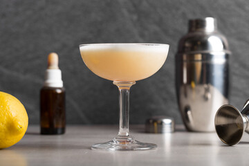 Whiskey Sour cocktail booze bourbon whiskey, lemon juice, simple syrup, egg white and aromatic...