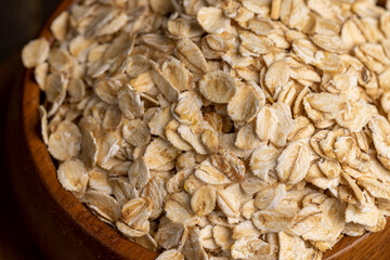 Oat flakes poured on the kitchen table