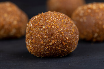 delicious round chocolate candy made of cocoa and sugar