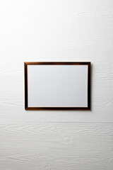 Vertical of empty brown frame with copy space on white wall