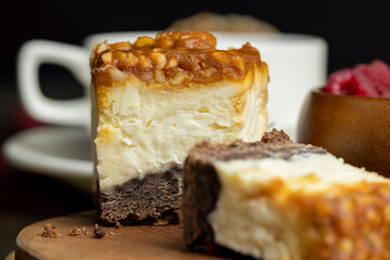 Cheesecake with chocolate sponge cake and peanuts in caramel