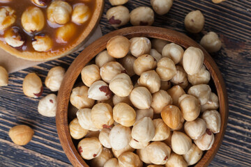 Roasted and shelled hazelnuts on the table, crisp fresh hazelnut harvest on the table in the kitchen