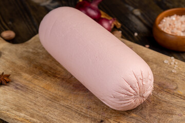 delicious fresh boiled sausage on a cutting board