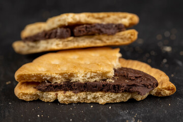 Fototapeta na wymiar crispy cookies with chocolate filling between cookies
