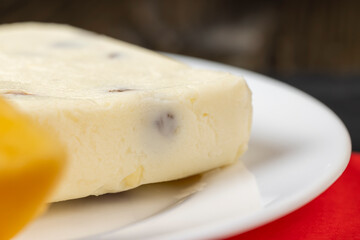soft curd cheese with raisins and persimmons
