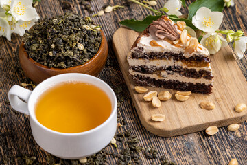 delicious cake with salted caramel and roasted peanuts