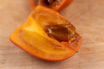 slices of sliced persimmon on a cutting board