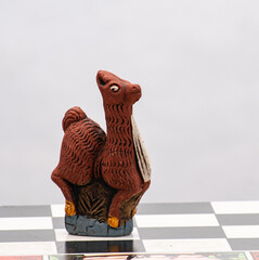 Inca version chess. Incas vs Spanish. Horse and llama on chessboard.