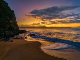 Aerial sunrise seascape with high cloud