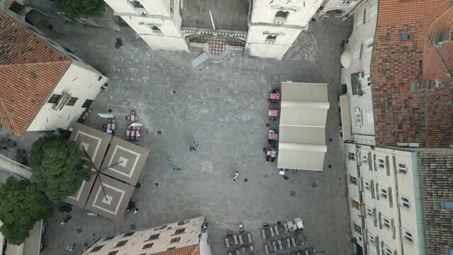 Top down drone dolley shot over the high St Tryphon Cathedral in Montenegro