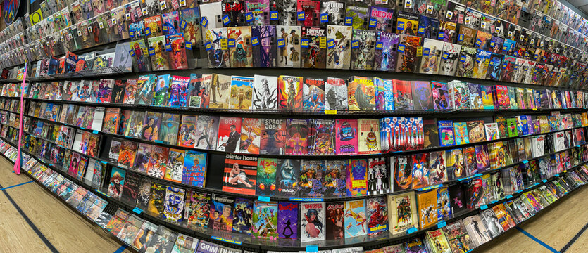 Variety of comic book titles available for sale at Midtown Comics store in Manhattan.