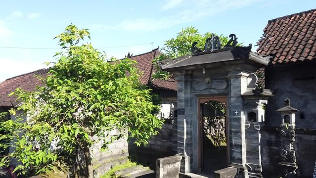 Balinese Village Traditional House Architecture in a Summer Day, Clear Blue Sky