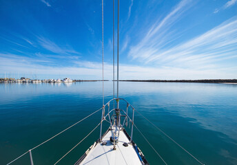 bow of yacht in the sea on a calm day with blue sky