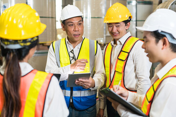 Professional industry engineer worker in a metal manufacture warehouse , maintenance service check for safety first concept .