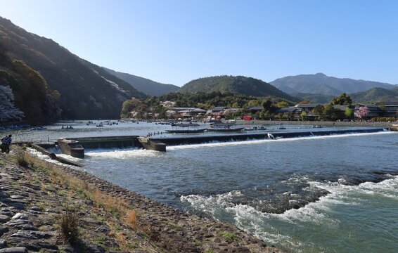 The scene of excursion boats and Hozu-gawa River at Arashiyama in Kyoto City in Japan 日本の京都市嵐山の遊覧舟と保津川