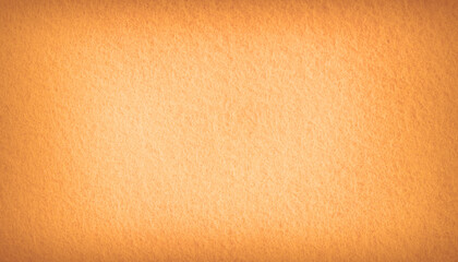 Yellow brown felt material. Surface of felted fabric texture abstract background in earth tones...