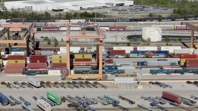 BNSF shipping yard in Memphis, Tennessee with drone video zoomed in with pan left to right.