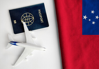 Flag of Samoa with passport and toy airplane. Flight travel concept
