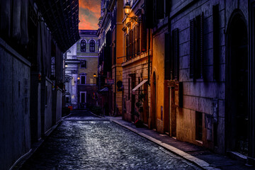 Fototapeta na wymiar Morning narrow side street after the rain in Rome, Italy