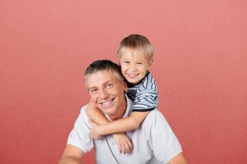 Happy young dad and child have fun