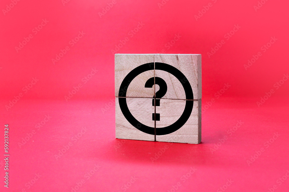 Aufkleber wooden square with question mark icon. the concept of questions or q and a. faq concept. define prob