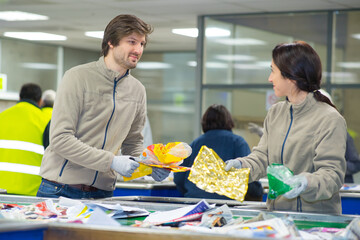 recycling workers researching on the landfill