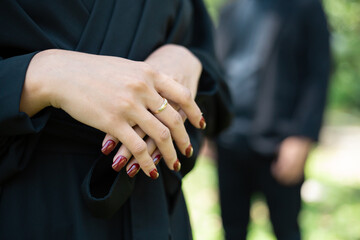 detail of the hand of the bride wearing the wedding ring