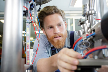 technician cutting working with cable