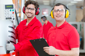 machine operator engineer smiling and posing