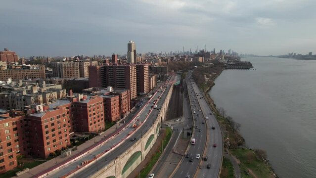 West Side Highway, New York. Traffic heading toward downtown Manhattan. Smooth aerial shot.