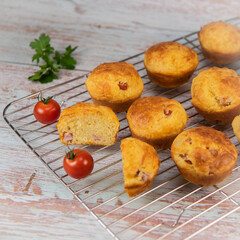 Savory muffin with ham and cheese on blue background, High quality photo