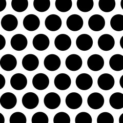 Black polka dots on white background 