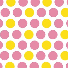 Yellow and pink  polka dots on white background 