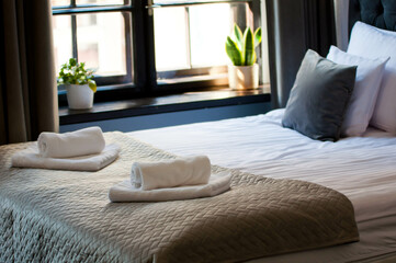 Fototapeta na wymiar Bed in the hotel room, detail in rooms